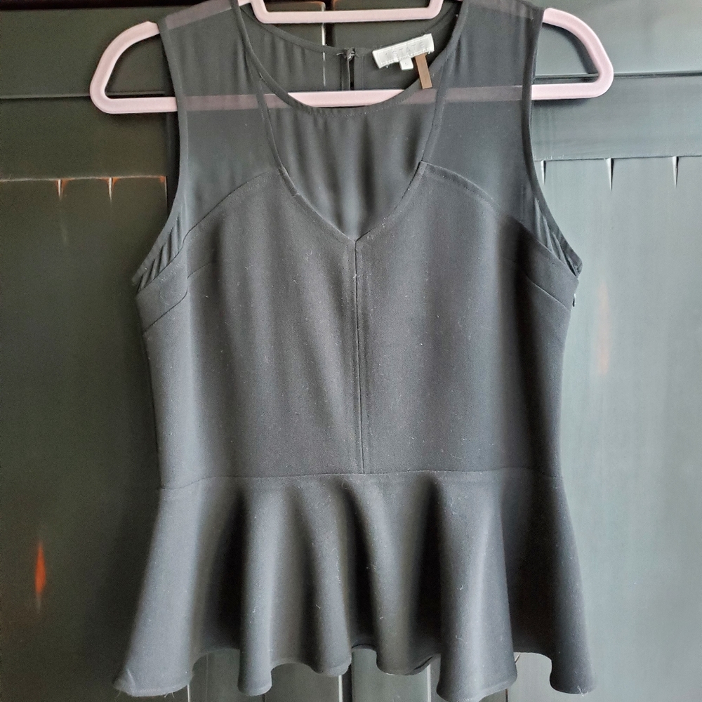 1. State peplum top